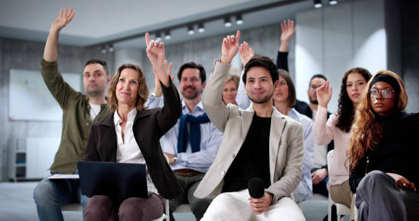 istock Diverse group of business professionals attending educational seminar 2197012479