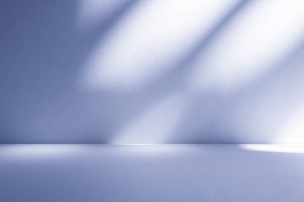istock Studio style background wall decoration presentation uses white and blue tones. with shadows cast from a nearby window, concept creating a decorative 2197016216