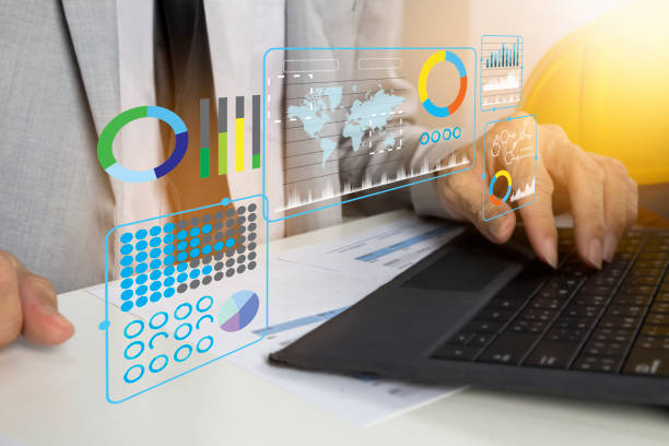 istock Analytical data business concept,Businessman opens work data and business figures to analyze and find ways to proceed with the project 2197018690
