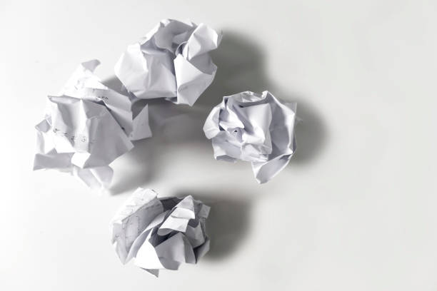 istock Crumpled white paper on a white background. This idea is illogical, ineffective, and not very effective. 2197018818