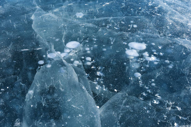 istock The ice bubbles appearing on the blue ice are very beautiful 2197019641