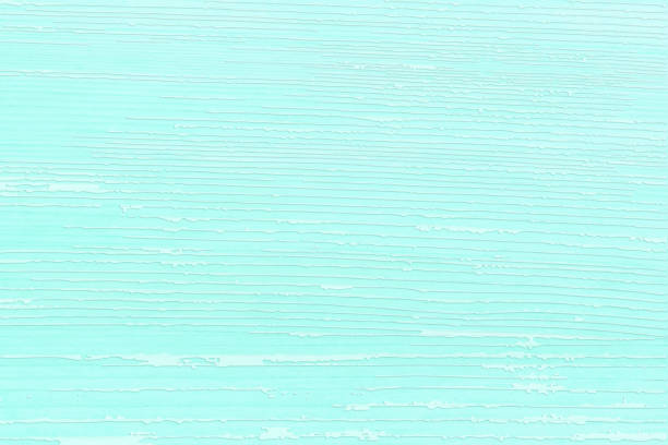 Cute 60's abstract image of a pop, bright mint blue with a white woodgrain embossed stripe pattern.
