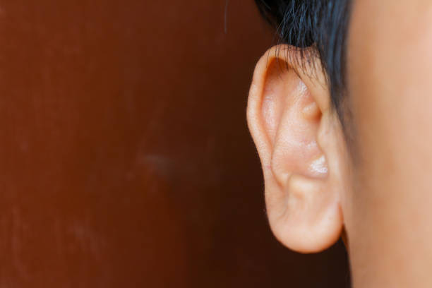 Close-up of a man's ear.