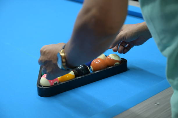 istock Close up Tidying up Billiard balls on a pool table 2197023833