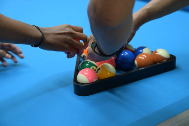 istock Close up Tidying up Billiard balls on a pool table 2197023834