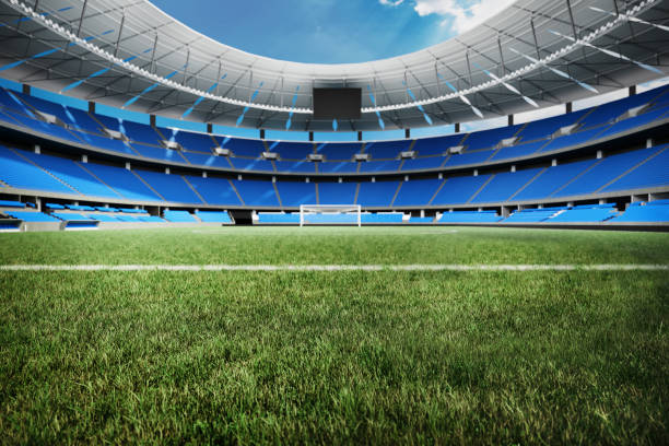 Football stadium background with green grass.