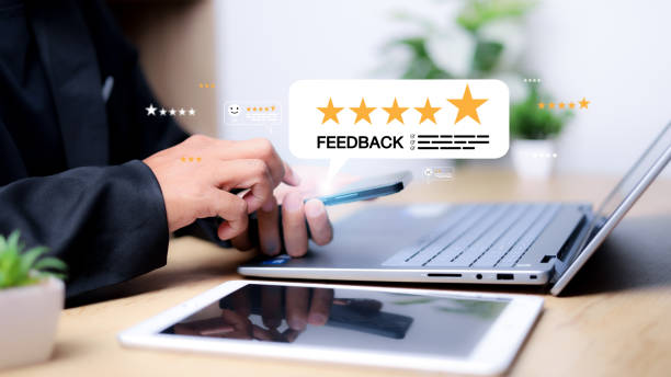istock Feedback concept, user comment rating online, writing feedback reviews, and reputation management on speech bubbles. 2197028735