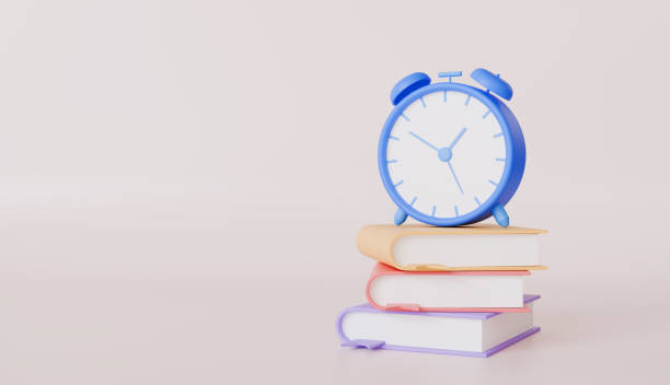 istock Pastel Alarm Clock on Stack of Books Education Time Management Study Concept 2197033734