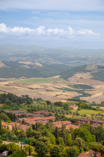 Italy, Tuscany. Hills and clouds in the sky on a sunny summer day