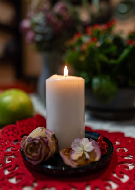 istock still life with white candle, dry flowers, fruits and other objects 2197034883
