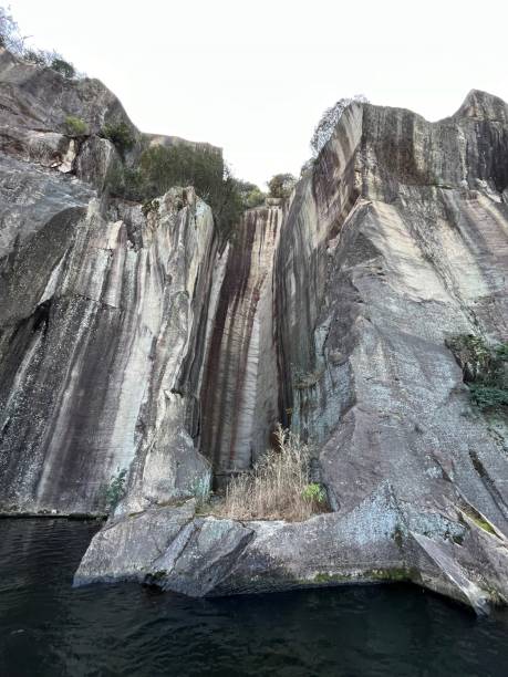istock Fascinating Rocky Cliff Bordering East Lake 2197034904