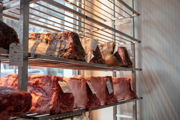 istock Selection of whole raw meat on racks 2197035909