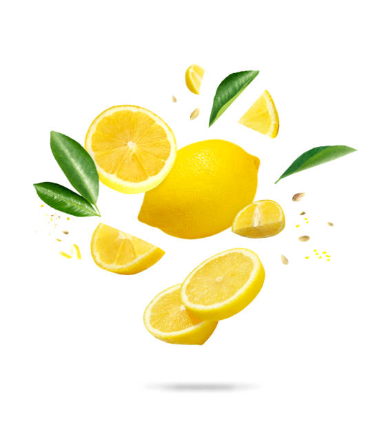 istock Lemon slices and leaves splash composition. Citrus pieces isolated on white. Summer refreshment concept, object nobody. 2197036097