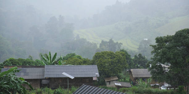 istock Rural village in the mountains on raining day 2197037789