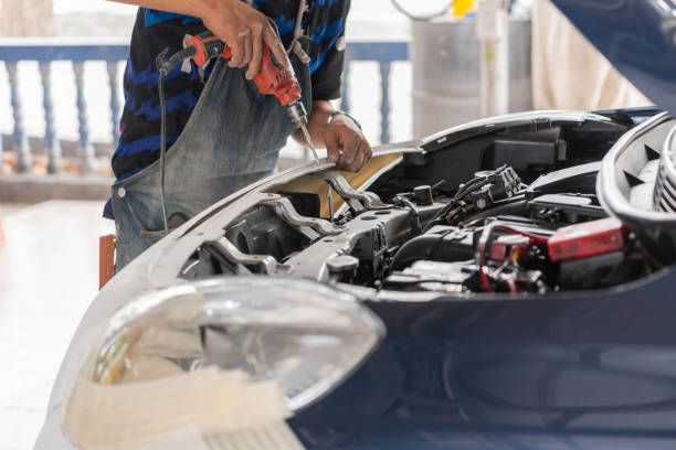 istock Checking car body work fiber bumper at car garage 2197040343