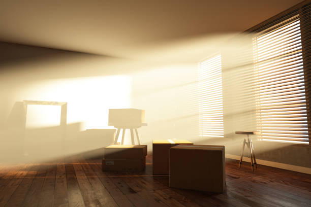 istock Moving into a new house Concept with Cardboard Boxes 2197042075