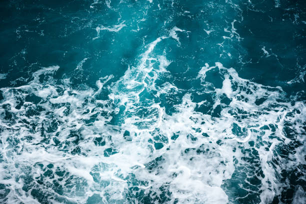 istock Azure bubbling Mediterranean Sea water with white foam 2197048560
