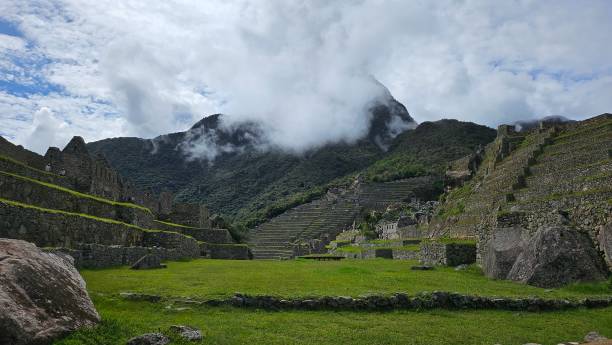 istock Ancient stone buildings inside ruins of Machu Picchu 2197048717