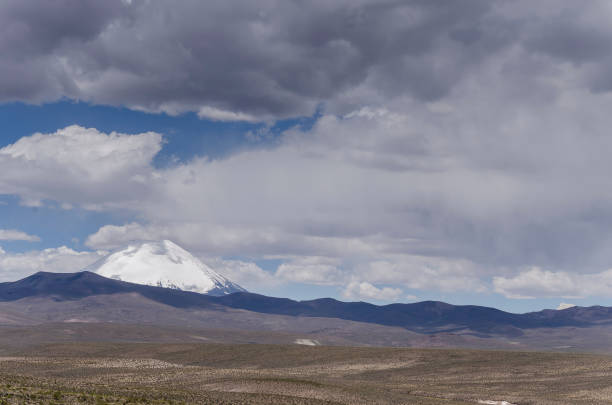Lauca National Park, Chile – Nestled in the Chilean Altiplano near the Bolivian border, Lauca National Park is a breathtaking expanse of high-altitude landscapes, snow-capped volcanoes, and shimmering lakes. The park’s crown jewel, Lake Chungará, sits at over 4,500 meters above sea level, reflecting the towering Parinacota and Pomerape volcanoes in its pristine waters. Home to diverse wildlife, including vicuñas, flamingos, and Andean condors, Lauca offers an untouched wilderness rich in biodiversity. The park is also dotted with ancient pre-Columbian ruins and small Andean villages, preserving the cultural heritage of the Aymara people. With its dramatic scenery and remote beauty, Lauca National Park is a paradise for nature lovers and adventure seekers exploring Chile’s far north.