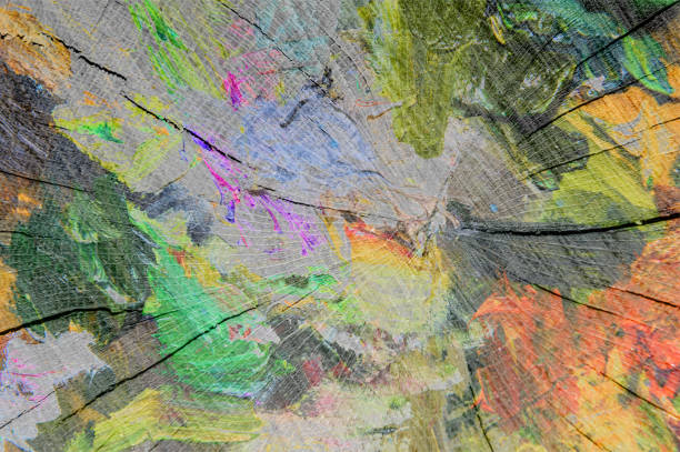 Wooden surface with colorful abstract designs. Background for banner, backdrop