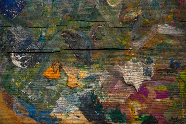 Wooden surface with colorful abstract designs. Background for banner, backdrop