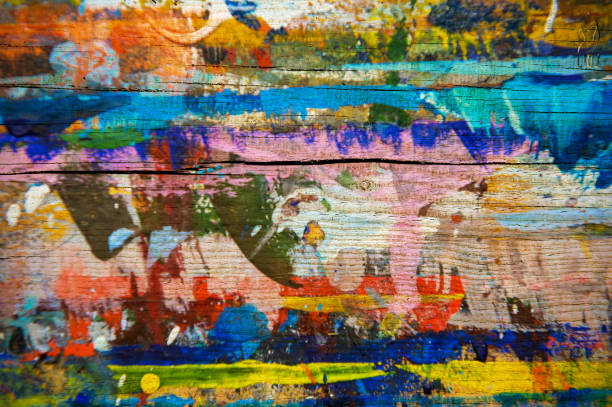 istock Wooden surface with colorful abstract designs. 2197056602
