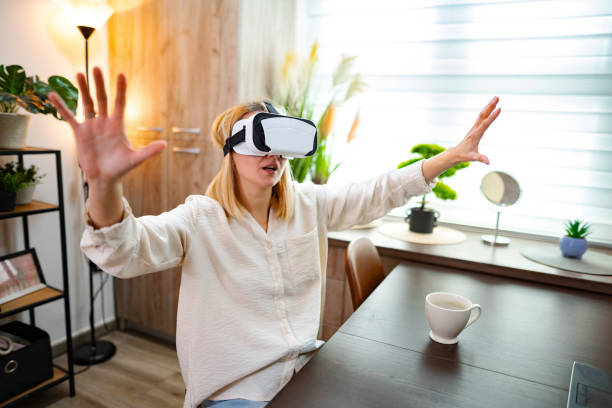 istock Immersed in virtual reality experience at home during a quiet afternoon 2197060146
