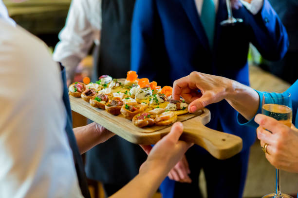 istock Wedding canapes being brought out by waiters 2197060843