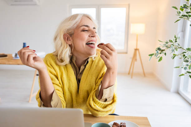 istock Happy Woman Smiling Over Her Laptop 2197064428