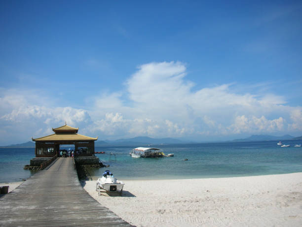 istock Ferry terminal under blue sky and white clouds in Sanya, Hainan 2197065359