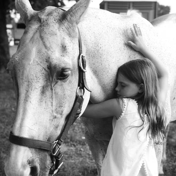 istock A girl and her pony 2197065466
