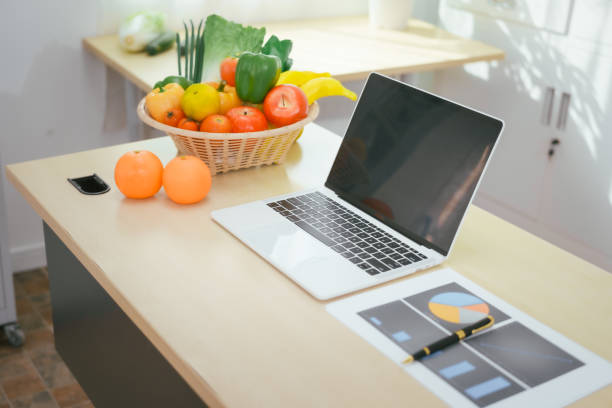 istock A desk with a fruit basket symbolizes a nutritionist's workspace, promoting healthy eating, balanced diets,wellness through the presentation of fresh fruits organized tools for nutritional planning 2197079049