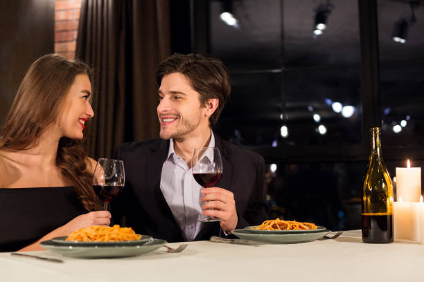 istock Romantic Dinner Date With Wine and Pasta in a Cozy Restaurant Setting 2197080902