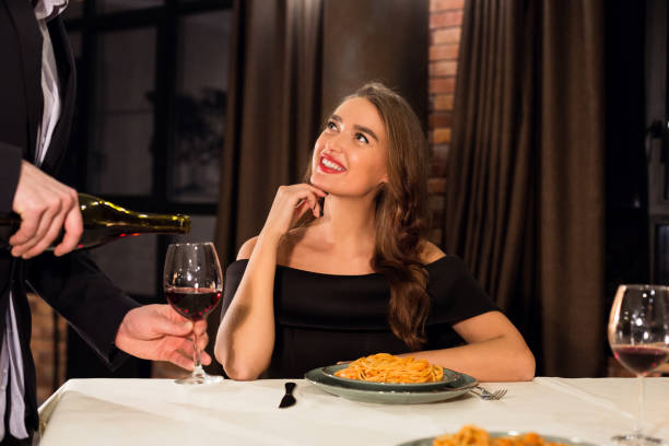 istock Enjoying a Romantic Dinner With Wine and Pasta in a Cozy Restaurant Setting 2197080908