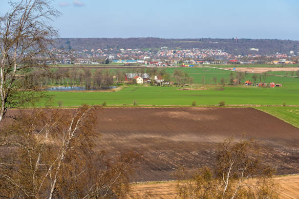 Landscape view of the fields towards a city