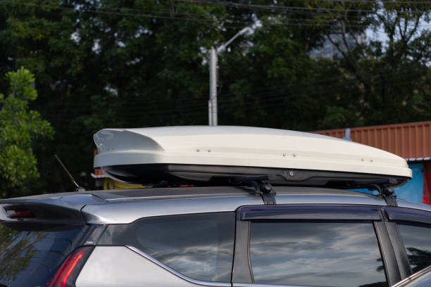 istock trunk or cargo box is on top of a car roof. 2197085673