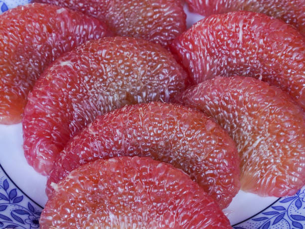 Tropical fruits are selling on Asian street food market stall.Phuket Island - Thailand.