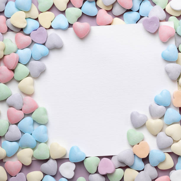 istock Pastel candy conversation hearts Valentine's Day background 2197091900