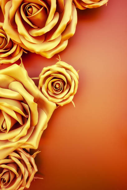 Floral background from artificial rose flowers. Vertical photo