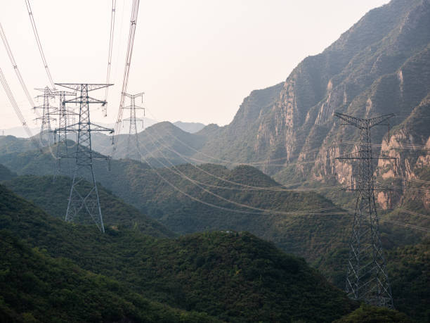 A high-voltage transmission tower built in the mountains