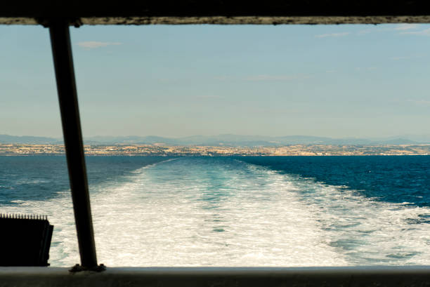 istock Trail on water surface behind of fast moving motor boat 2197101307