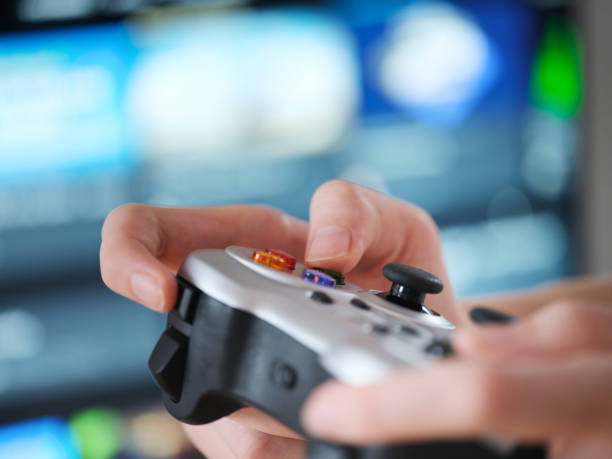 istock A teenager playing video games using a gamepad. 2197103472