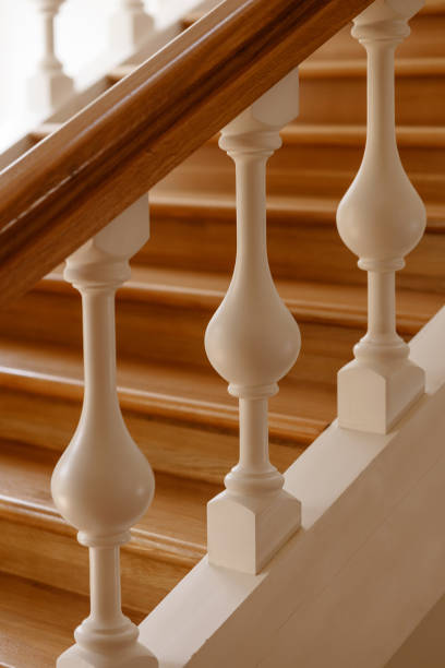 istock Luxurious wooden staircase with white balusters. 2197104906