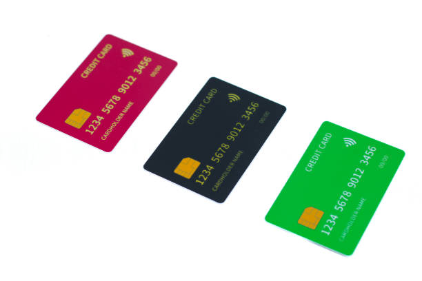 istock three credit cards with large limits isolated on white background.business concept 2197106458