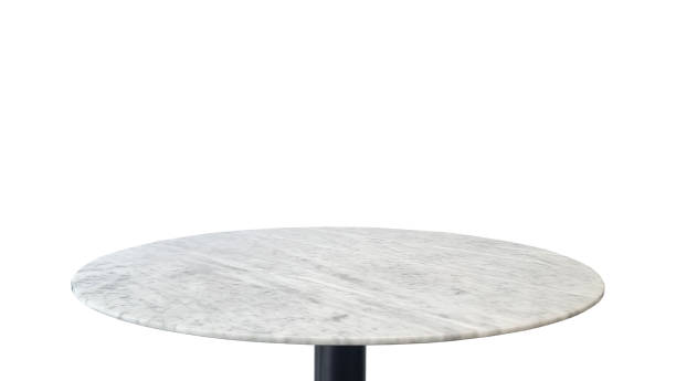 istock studio shot of a round, polished carrara marble stone tabletop isolated on a background with clipping path, suitable for use as a dining, display surface, advertising. 2197106819