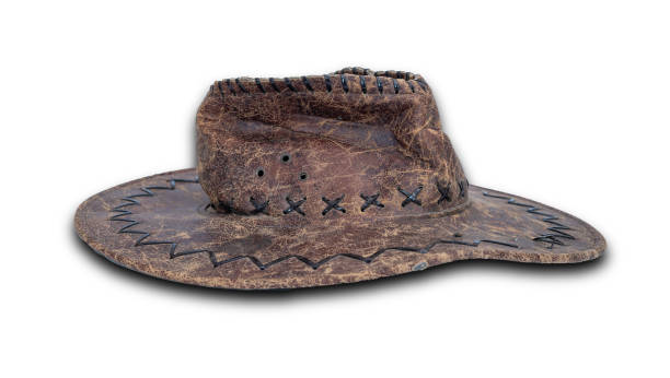 Old west cowboy hat on wooden table.
