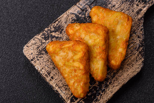 istock Hash browns with potatoes and onions, salt and spices 2197108769