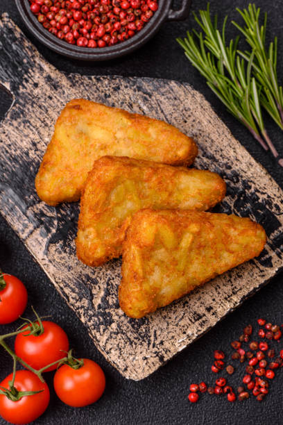 istock Hash browns with potatoes and onions, salt and spices 2197108949