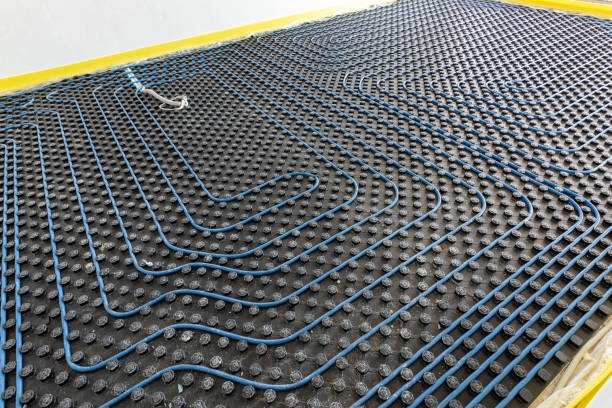 istock System of underfloor heating. Installation of a heat flooring system. Modern heating system in a new home 2197111795
