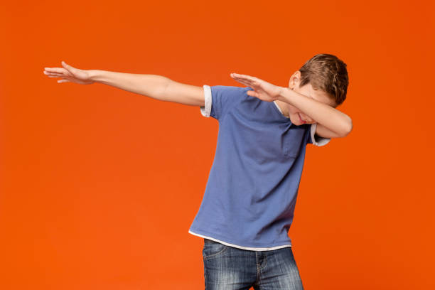 istock Trendy teenager making dab gesture, having fun 2197112125